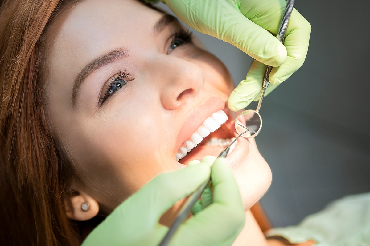 woman in dental chair smiling